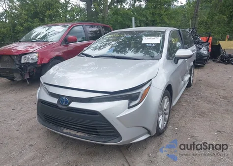 2025 Toyota Corolla Hybrid Le from USA, damaged, VIN JTDBCMFE4S3084450